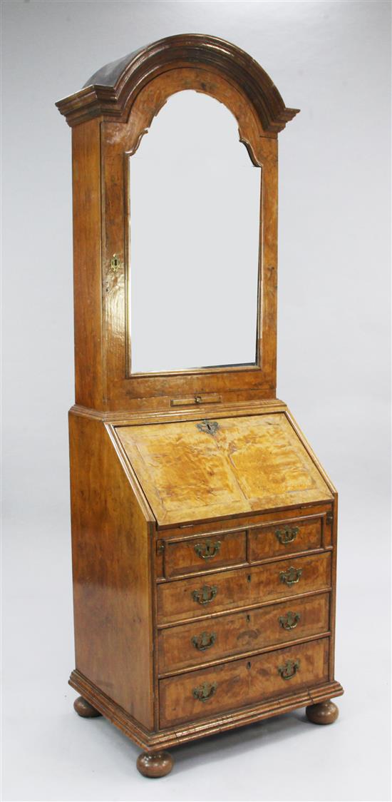 A Queen Anne style dome top walnut bureau bookcase, H.6ft 2in.